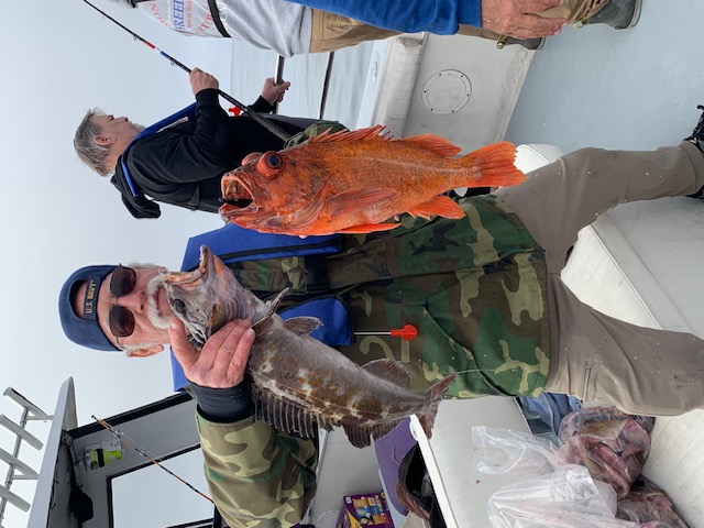 U.S. Navy veteran holding rockfish and lingcod catch
