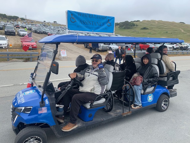 Wheelchair assistance shuttle with veterans at Laguna Seca