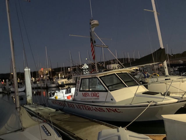 Monterey Bay Veterans boat docked at harbor at dusk