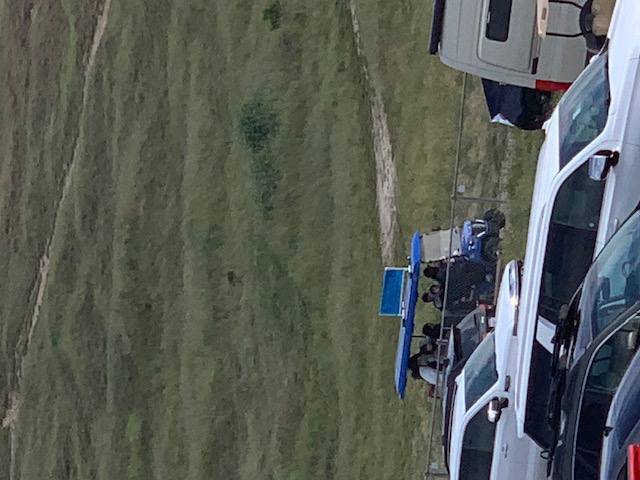 ADA shuttle in parking area at Laguna Seca event