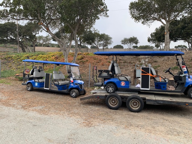 Two blue MBV shuttles on trailer ready for transport