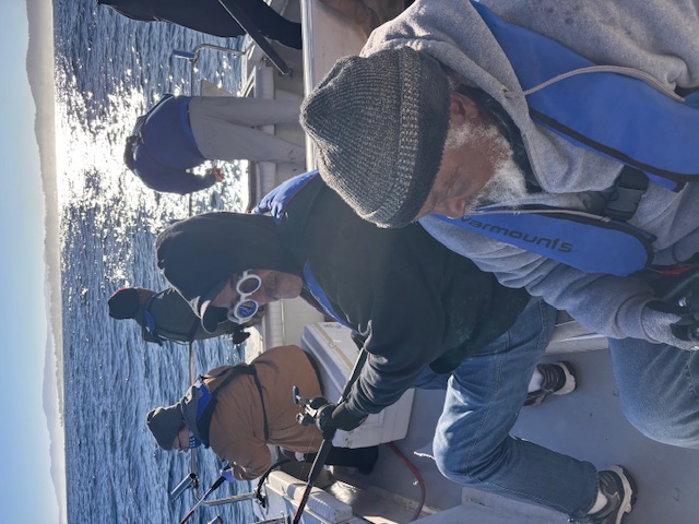 Veterans fishing on overcast day on Monterey Bay